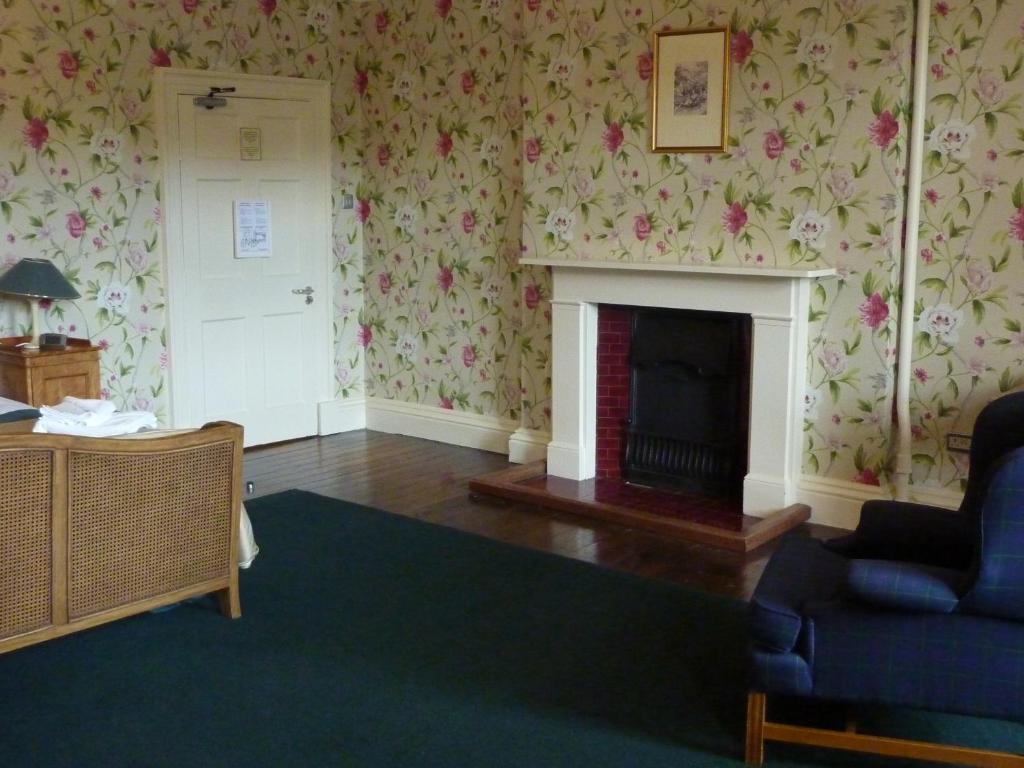 Gregynog Hall Casa de hóspedes Tregynon Quarto foto