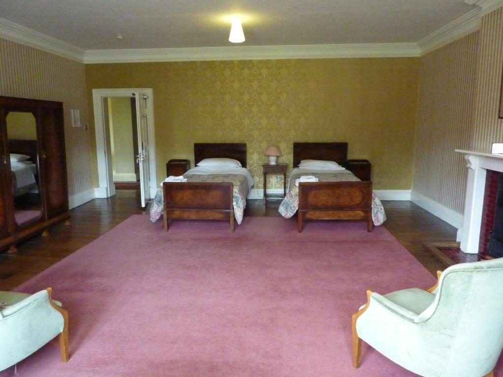 Gregynog Hall Casa de hóspedes Tregynon Quarto foto